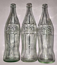 Collection of THREE vintage Coca-Cola bottles of 77 CL arabic writting old picture
