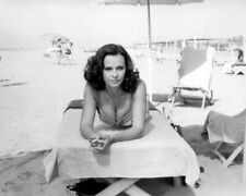 Laura Antonelli 1970's in bikini lying on beach chair 24x36 inch poster picture