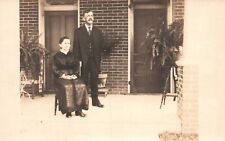 Vintage Postcard 1910's Old Man and Woman Husband Wife In Front Doors picture