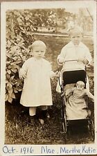 RPPC Children Pushing Doll in Baby Carriage Pram Real Photo Postcard c1910 picture
