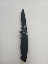 Benchmade Preowned F.A. Dual edge folder. 154CM, 3.25'' blade. rare. nice.'97-98 picture