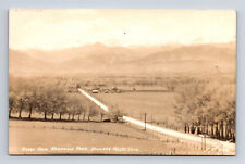 RPPC Scenic View of Arapahoe Road Farms & Mountains Postcard picture