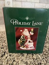 Vintage Macy’s Holiday Lane 8.5” Santa Claus Delivering Tree. 2003 picture