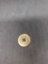 Chinese Coin with a Square cut out in the middle. picture