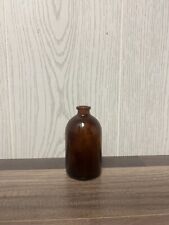 Small Vintage Amber Glass Bottle picture