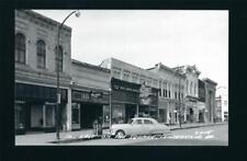 Centerville Iowa IA c1943 RPPC Marions, Shoes, Red Cross Drug, Cafe, Hdw, Sherms picture