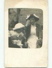 circa 1910 rppc DOG IN CORNER & BABY WITH TOY SHOVEL : : make an offer o2537 picture