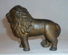 Antique Gold Colored Cast Iron Still Penny Bank Standing Lion With Tail Right picture