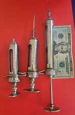 Lot Of 3 Vintage w OM Franklin Serum Syringes Metal/Glass. Large And Rare picture