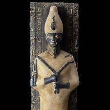 Egyptian God Osiris Statue with a Wall having Ancient Inscriptions from Stone picture