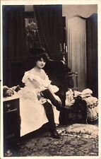 PRETTY WOMAN GETTING DRESSED : WEARING LINGERIE : RISQUE : NPG : RPPC picture