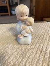 preowned 1982 girl holding doll,figurine form christopher , lifton collection picture