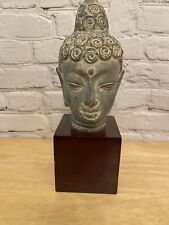 ceramic Buddha head figurine on a brown wood stand 12” picture