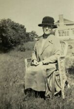 Woman Wearing Hat Sitting In Chair By House B&W Photograph 2.5 x 4.25 picture