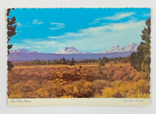 Looking west toward the Cascade Range with The Three Sisters Oregon Postcard picture