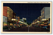 c1950's Broad Street Looking West at Night Elyria Ohio OH Unposted Postcard picture
