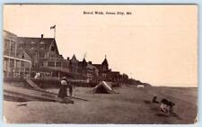 1911 OCEAN CITY MARYLAND MD BOARDWALK TENTS ON BEACH HOTELS OCEANFRONT POSTCARD picture
