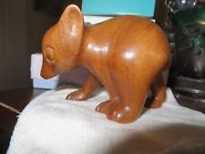 Vintage Native Cherokee carved wood bear cub. signed picture