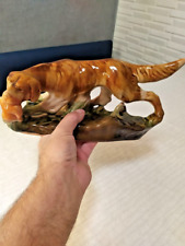 Vintage faience figurine of the USSR. Dog on the hunt picture