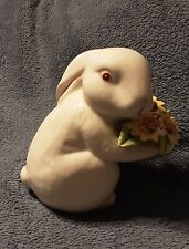 Adorable Little White Bunny/Rabbit holding Sunflowers picture