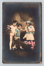 RPPC Hand Colored Studio Portrait of Young Boy & Two Girls Flowers Postcard picture