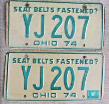 Lot of 2 Vintage Original Metal Embossed OHIO Green / White License Plates 1974 picture