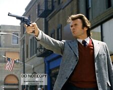 CLINT EASTWOOD BRANDISHING HIS .44 MAGNUM IN 