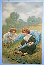 210. Embossed Greeting Postcard with Children from the early 1900's picture