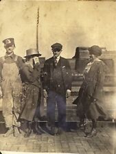 Early 1900s Snapshot Photo Railroad Worker In Uniform & Woman Hiding Face  picture