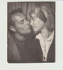 VINTAGE PHOTO BOOTH - AFFECTIONATE, ATTRACTIVE YOUNG COUPLE picture