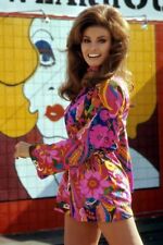 Raquel Welch circa 1968 poses for press cameras in mini skirt 12x18 poster picture
