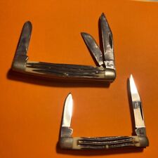 A Lot Of (2) QUEEN “Father/Son” Trappers (1) 3” & (1) 2 1/2” Bone Handles Used picture