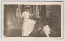 Postcard Vintage RPPC Young Couple Having Fun in the Front Yard picture
