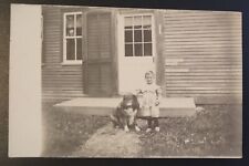 RPPC Child With Dog Posing Man Looking Out Of The Window picture