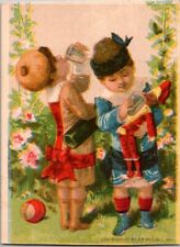 1884 A B Seeley Victorian Trade Card Girls With Wine Bottle Giving Doll A Drink picture