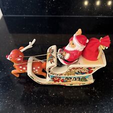 VINTAGE 1980'S CHRISTMAS SANTA BUMP N GO SLED ELECTRONIC LIGHT UP & SOUNDS TOY.  picture