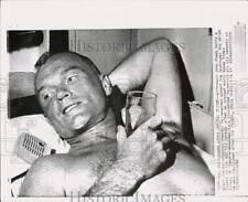 1962 Press Photo Astronaut John Glenn during physical checkup aboard ship 