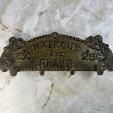 VINTAGE CAST IRON SIGN | HAIRCUT AND SHAVE 25¢ | 4 - Coat Hook | picture