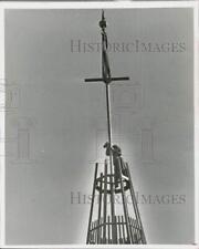 1969 Press Photo Reverend John Kopp Above John Knox Presbyterian Church on Crane picture