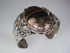 OLD NAVAJO STAMPED STERLING SILVER & PETRIFIED WOOD BRACELET w/ Indian Arrows picture