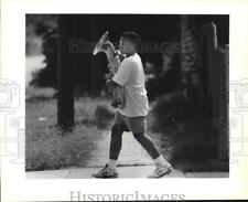 1990 Press Photo Corey Owens leaves school during Orleans Parish Board strike picture