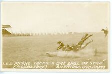 Postcard Rodeo Sheridan WY Lee Moore Takes a Bad Spill on Star Doubleday RPPC  picture