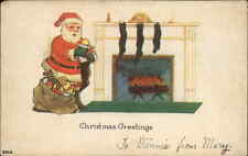 Christmas Santa Claus Fireplace Stockings c1900s-10s Postcard picture