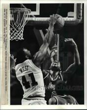 1988 Press Photo Mark West blocks a shot by John Drew one of 6 blocked shots picture
