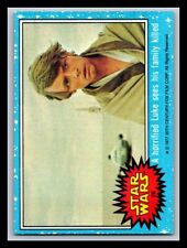 1977 Topps Star Wars #26 A horrified Luke see his family killed picture