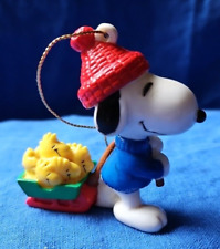 Vintage 1990s SNOOPY PULLING A SLED OF WOODSTOCK Hard Rubber Ornament EXC Cond picture