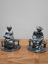 Pair Of Cast Iron Bookends Pioneer Amish Man And Woman on a Bench Figurine Black picture