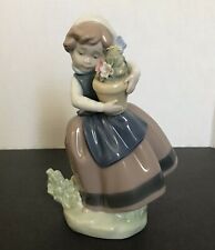 Lladro Spring is Here Girl Carrying Flower Pot Glossy Finish 6.75 in Figurine picture