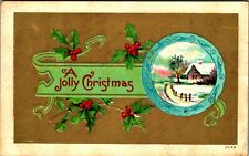Holly WIndow Cabin Scene A Jolly Christmas Gilt Embossed 1910s DB Postcard picture
