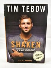 TIM TEBOW SIGNED AUTOGRAPHED COPY OF HIS HARD COVER BOOK 'SHAKEN ' picture
